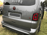 VW T5, T5.1 Portellone posteriore fumé Luci posteriori LHD Barre rosse LED Guida a sinistra Solo furgone MK3